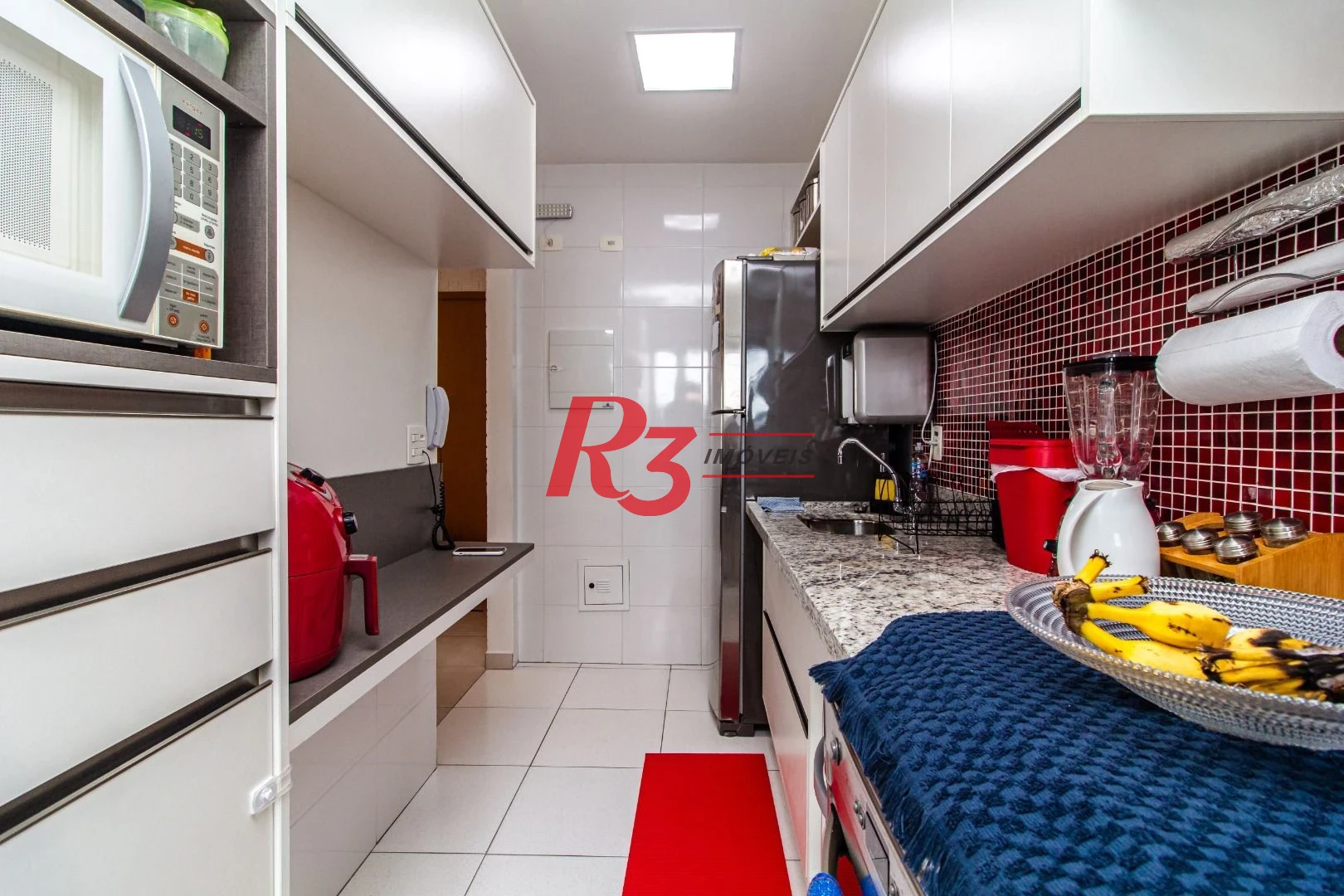 Apartamento à venda, 84 m² por R$ 1.250.000,00 - Gonzaga - Santos/SP