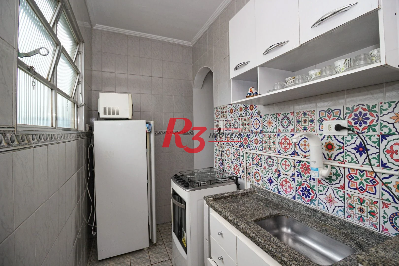 Apartamento com 1 dormitório para alugar, 40 m² por R$ 3.000,00/mês - Ponta da Praia - Santos/SP