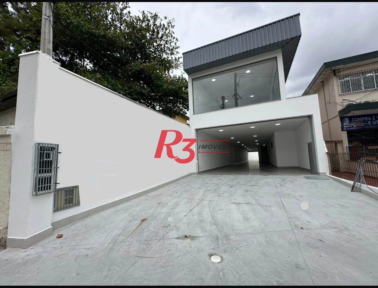 Loja, 550 m² - venda por R$ 3.500.000,00 ou aluguel por R$ 26.050,00/mês - Encruzilhada - Santos/SP