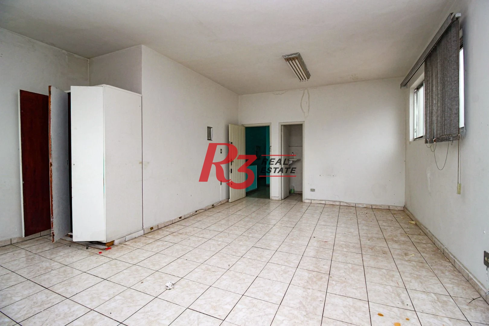 Loja, 570 m² - venda por R$ 1.900.000,00 ou aluguel por R$ 16.181,04/mês - Encruzilhada - Santos/SP