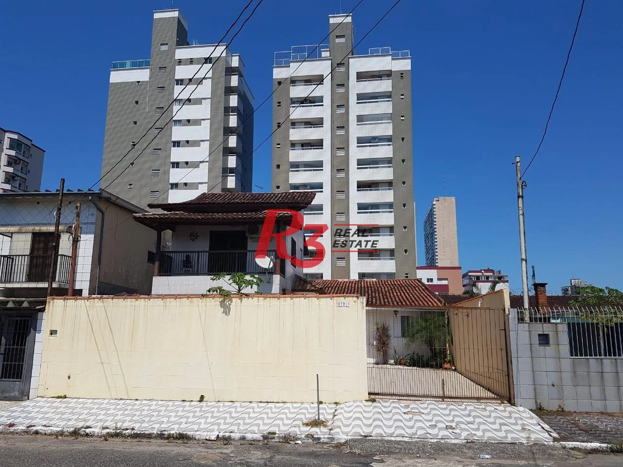 Sobrado com 3 dormitórios à venda, 124 m² por R$ 930.000,00 - Mirim - Praia Grande/SP