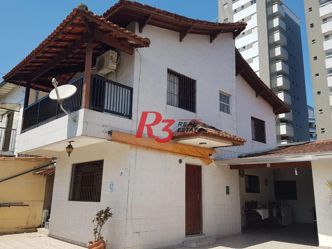 Sobrado com 3 dormitórios à venda, 124 m² por R$ 930.000,00 - Mirim - Praia Grande/SP