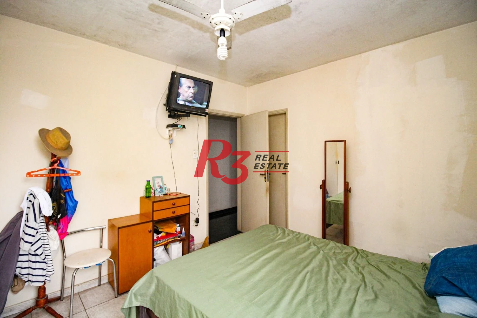 Sobrado com 3 dormitórios à venda, 350 m² por R$ 1.450.000,00 - Encruzilhada - Santos/SP