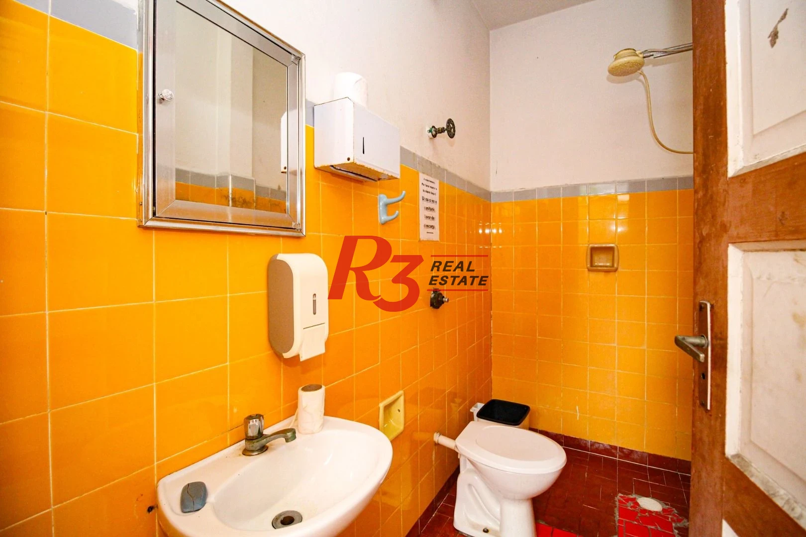 Sobrado com 3 dormitórios à venda, 350 m² por R$ 1.450.000,00 - Encruzilhada - Santos/SP
