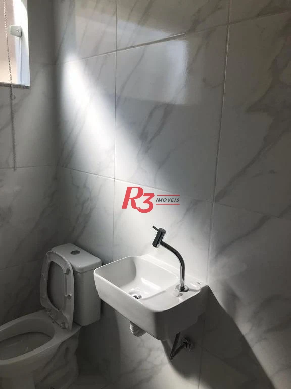 Sobrado à venda, 116 m² por R$ 690.000,00 - Gonzaga - Santos/SP