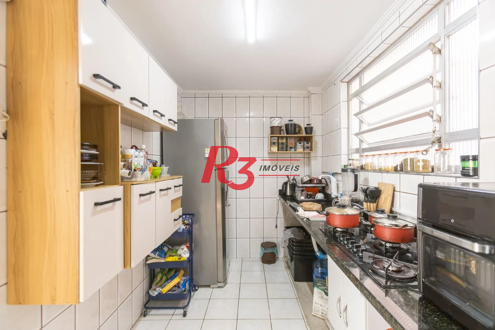 Apartamento com 2 dormitórios à venda, 67 m² por R$ 470.000,00 - Gonzaga - Santos/SP
