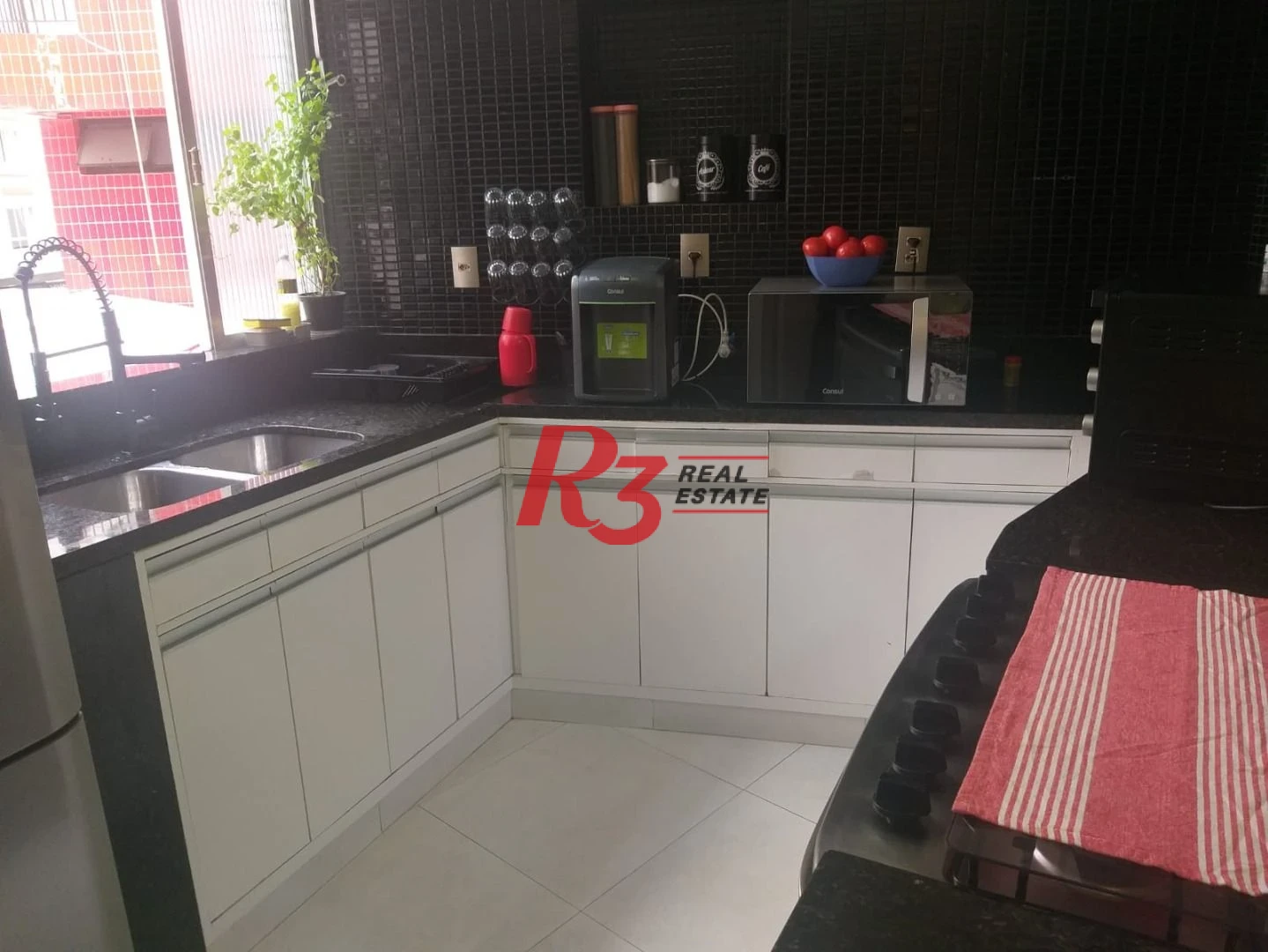 Apartamento com 3 dormitórios à venda, 156 m² por R$ 1.100.000,00 - Gonzaga - Santos/SP