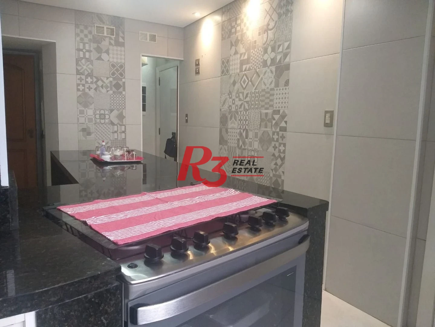 Apartamento com 3 dormitórios à venda, 156 m² por R$ 1.100.000,00 - Gonzaga - Santos/SP