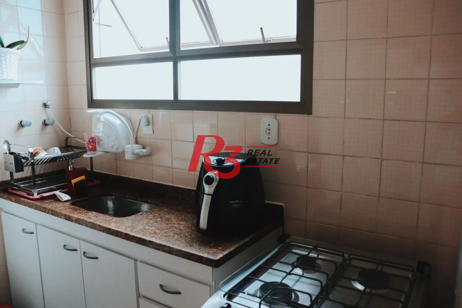 Apartamento com 2 dormitórios à venda, 58 m² por R$ 360.000,00 - Centro - São Vicente/SP