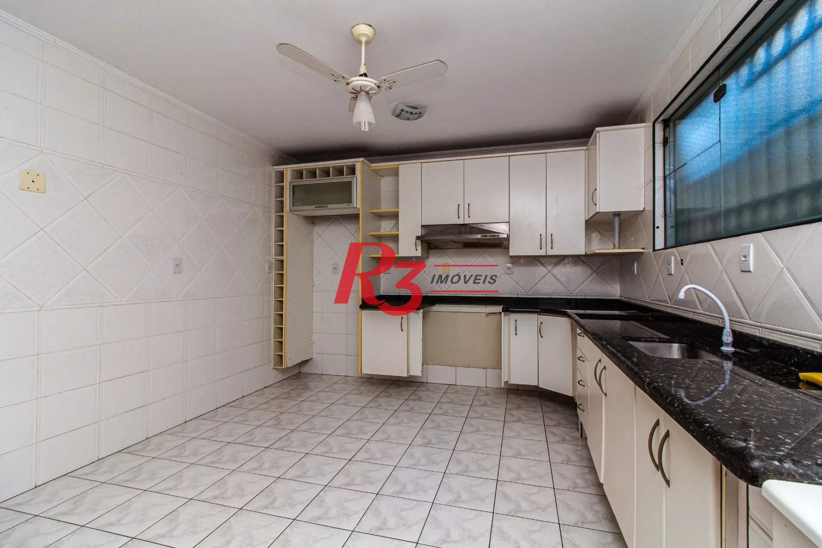 Sobrado com 3 dormitórios à venda, 148 m² por R$ 1.920.000,00 - Ponta da Praia - Santos/SP