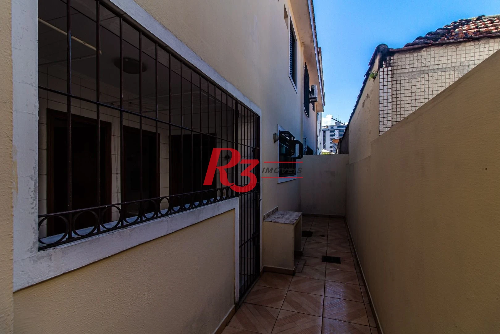 Sobrado com 3 dormitórios à venda, 148 m² por R$ 1.920.000,00 - Ponta da Praia - Santos/SP
