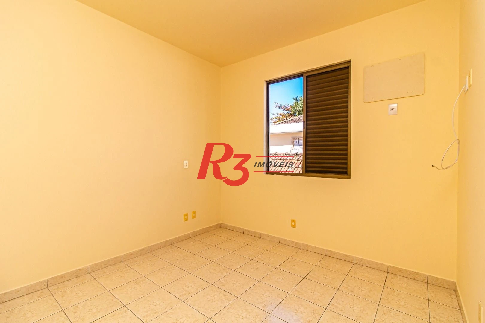Sobrado com 3 dormitórios à venda, 148 m² por R$ 1.920.000,00 - Ponta da Praia - Santos/SP
