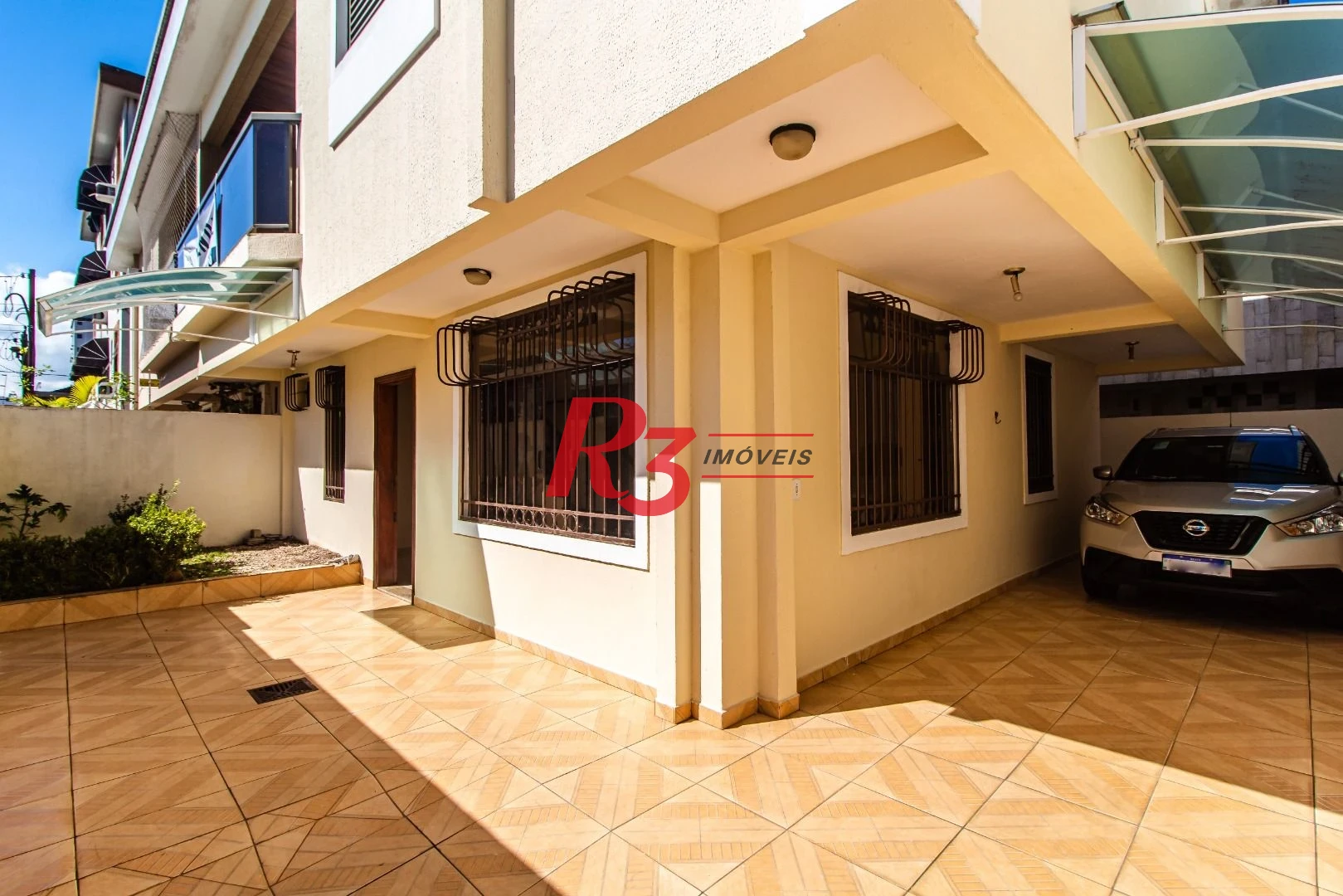 Sobrado com 3 dormitórios à venda, 148 m² por R$ 1.920.000,00 - Ponta da Praia - Santos/SP