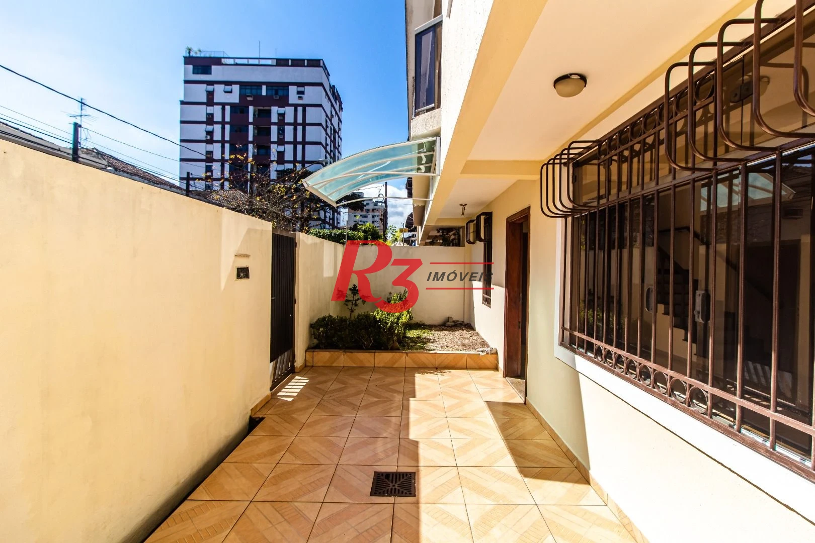 Sobrado com 3 dormitórios à venda, 148 m² por R$ 1.920.000,00 - Ponta da Praia - Santos/SP