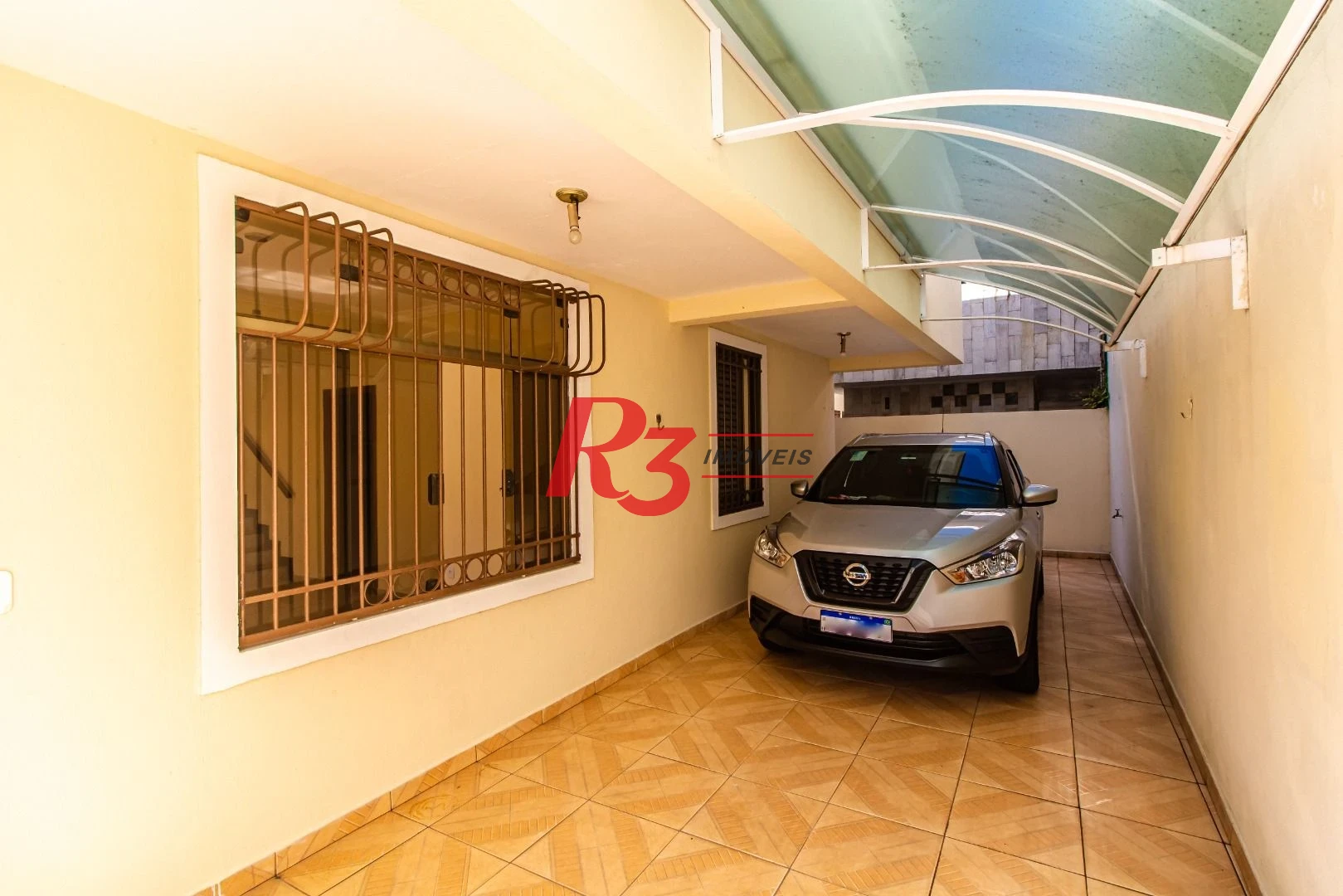 Sobrado com 3 dormitórios à venda, 148 m² por R$ 1.920.000,00 - Ponta da Praia - Santos/SP