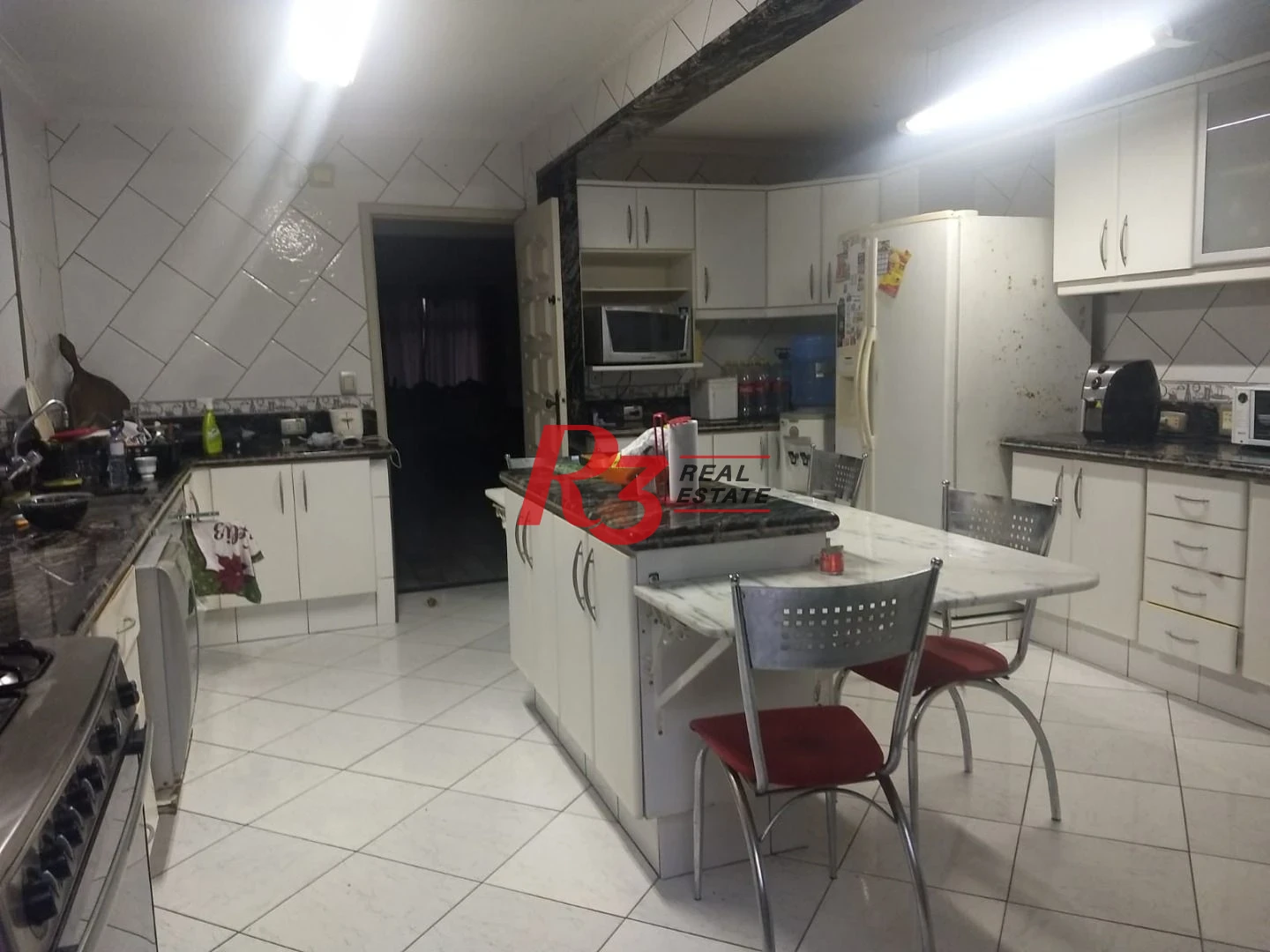 Sobrado com 3 dormitórios à venda, 250 m² por R$ 1.070.000,00 - Campo Grande - Santos/SP