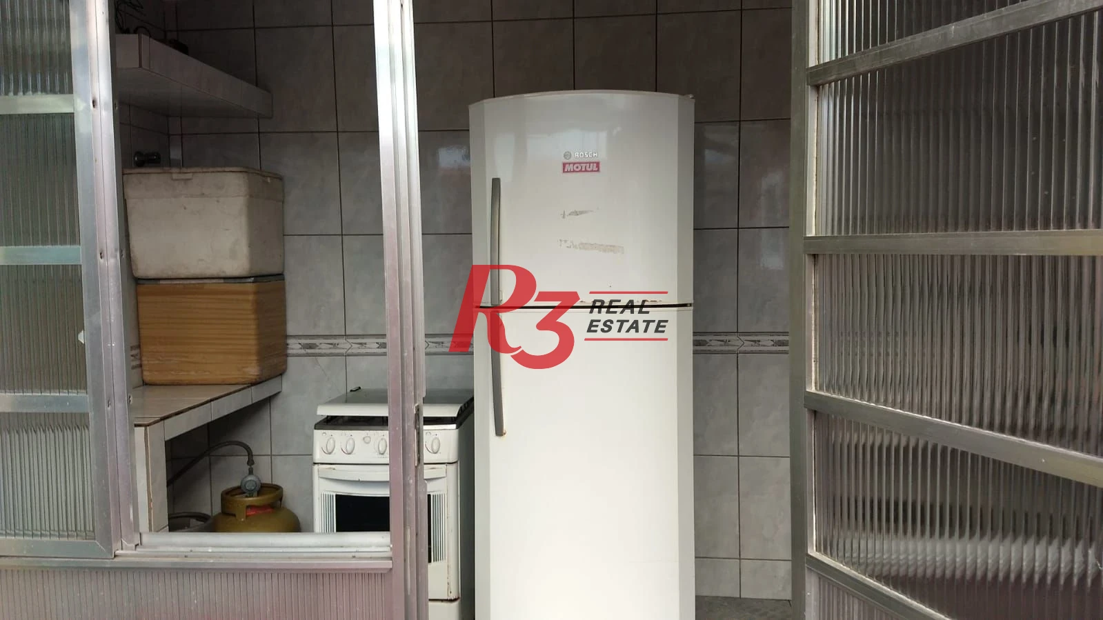 Sobrado com 3 dormitórios à venda, 250 m² por R$ 1.070.000,00 - Campo Grande - Santos/SP