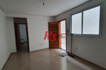 Apartamento térreo com 2 dormitórios à venda, 58 m² - Vila Voturuá - São Vicente/SP