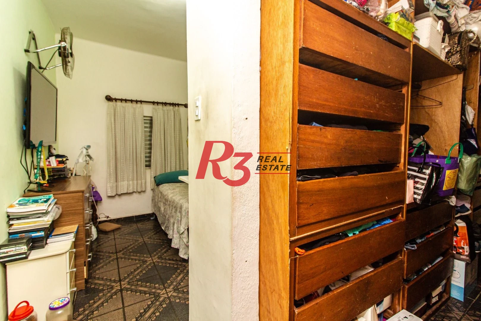 Sobreposta térrea com 2 dormitórios à venda, 135 m² - Embaré - Santos/SP