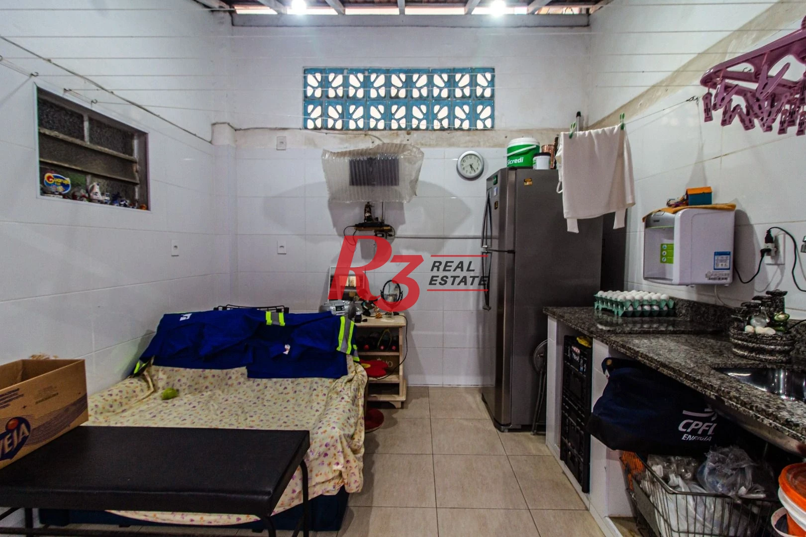 Sobreposta térrea com 2 dormitórios à venda, 135 m² - Embaré - Santos/SP