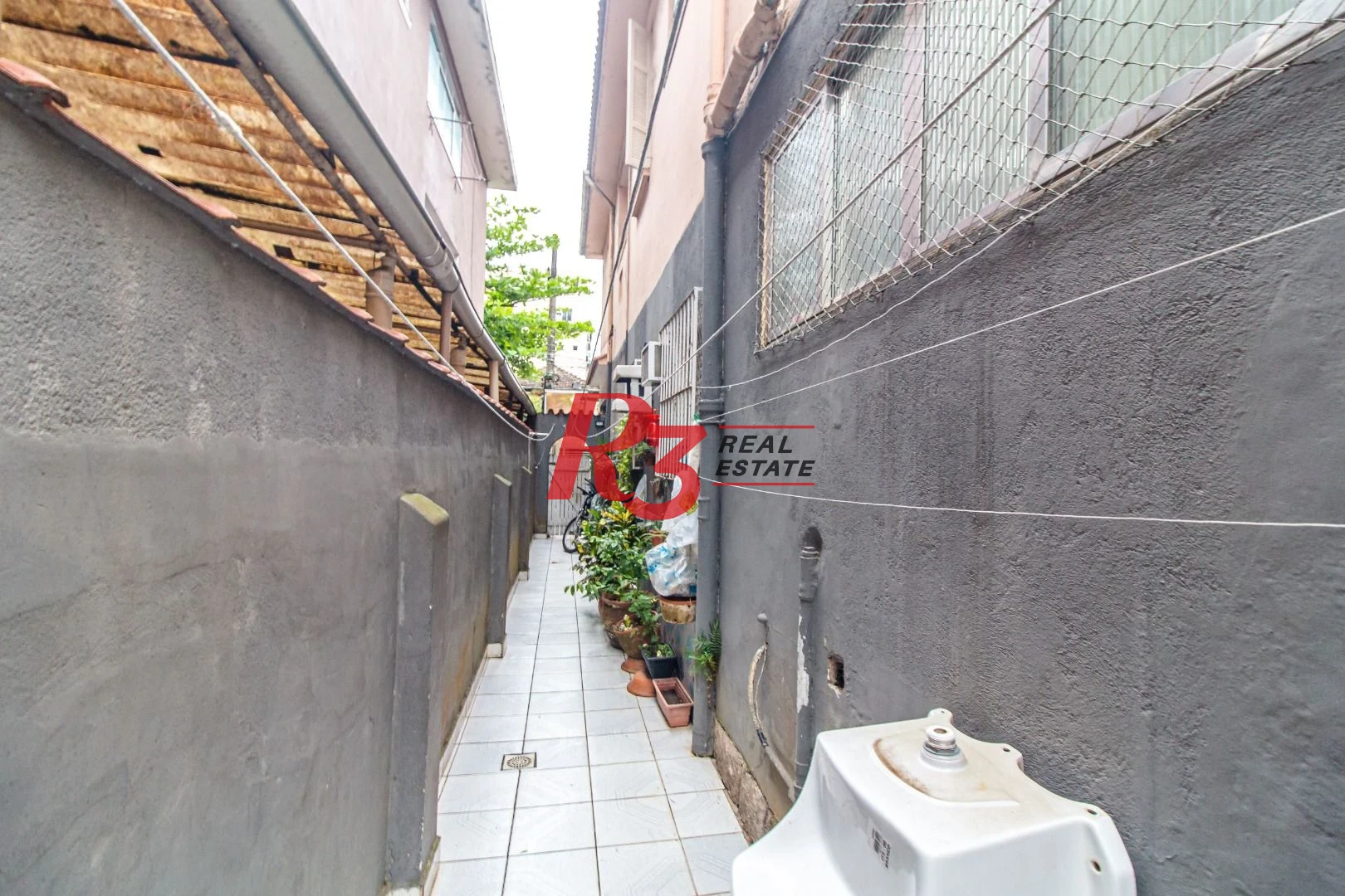 Sobreposta térrea com 2 dormitórios à venda, 135 m² - Embaré - Santos/SP