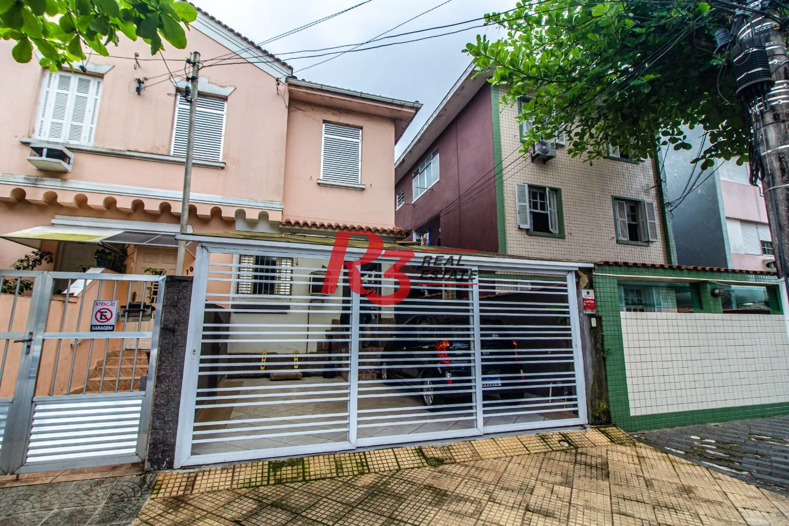Sobreposta térrea com 2 dormitórios à venda, 135 m² - Embaré - Santos/SP