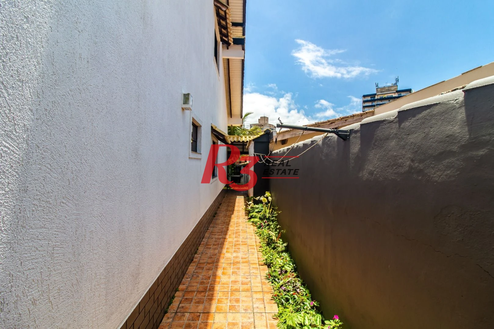 Casa com 4 dormitórios à venda, 360m² útil, R$ 1.250.000 - Praia do Tombo - Guarujá/SP