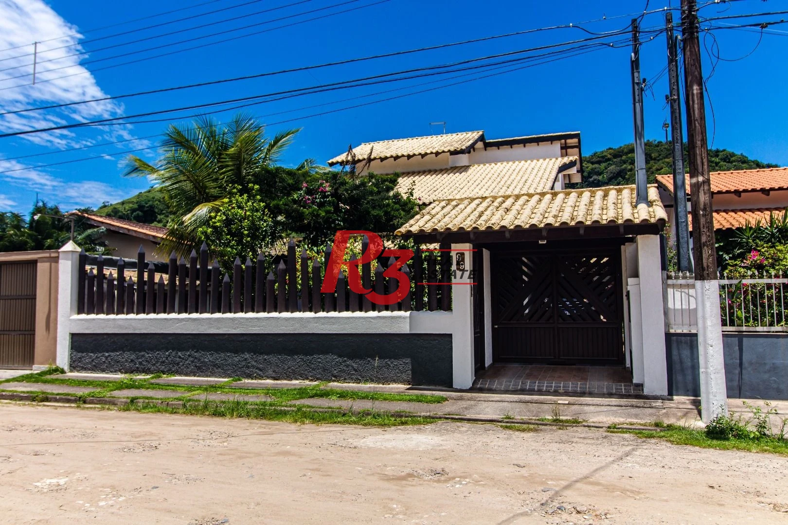 Casa com 4 dormitórios à venda, 360m² útil, R$ 1.250.000 - Praia do Tombo - Guarujá/SP