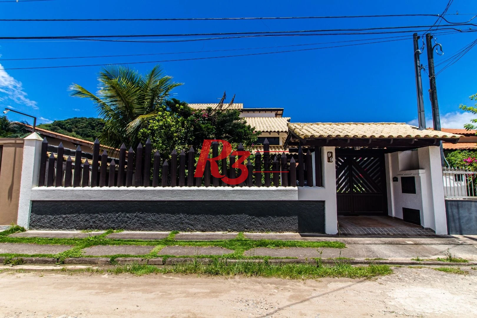 Casa com 4 dormitórios à venda, 360m² útil, R$ 1.250.000 - Praia do Tombo - Guarujá/SP