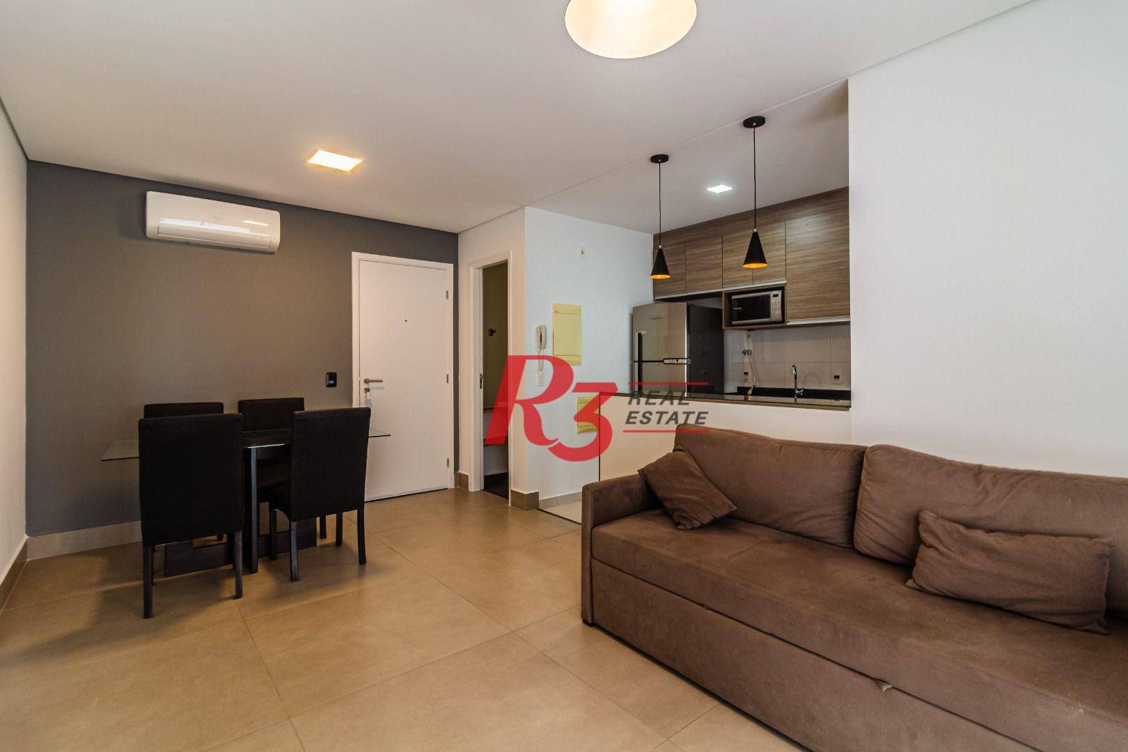 Apartamento com 1 dormitório para alugar, 57 m² - Gonzaga - Santos/SP