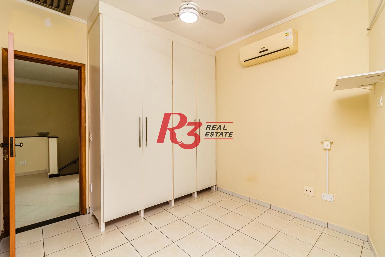Casa com 3 dormitórios à venda, 150 m² por R$ 1.100.000,00 - Embaré - Santos/SP