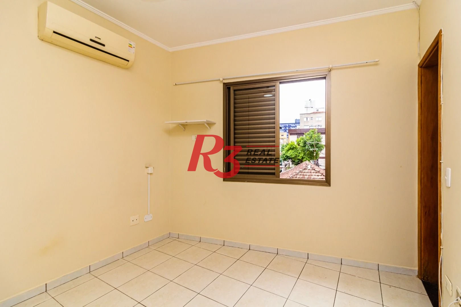 Casa com 3 dormitórios à venda, 150 m² por R$ 1.100.000,00 - Embaré - Santos/SP