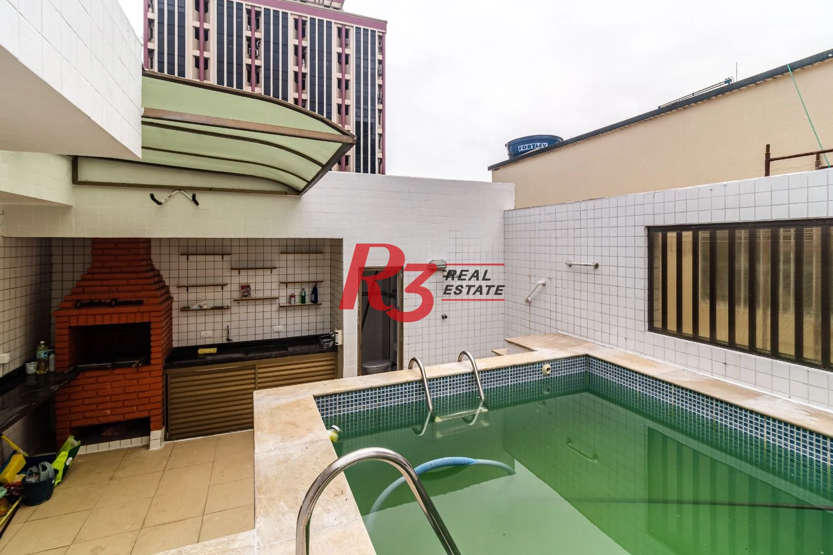 Casa com 3 dormitórios à venda, 150 m² por R$ 1.100.000,00 - Embaré - Santos/SP