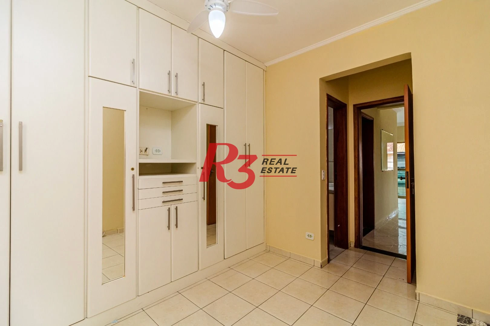 Casa com 3 dormitórios à venda, 150 m² por R$ 1.100.000,00 - Embaré - Santos/SP