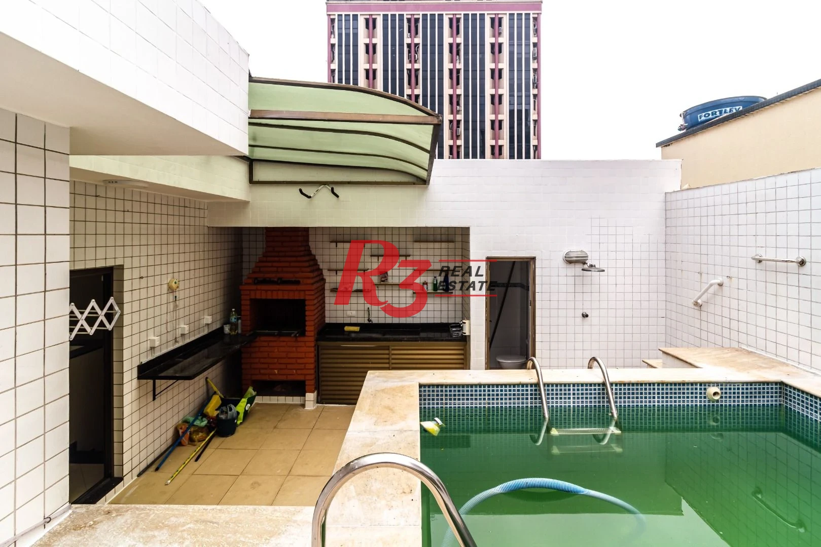Casa com 3 dormitórios à venda, 150 m² por R$ 1.100.000,00 - Embaré - Santos/SP