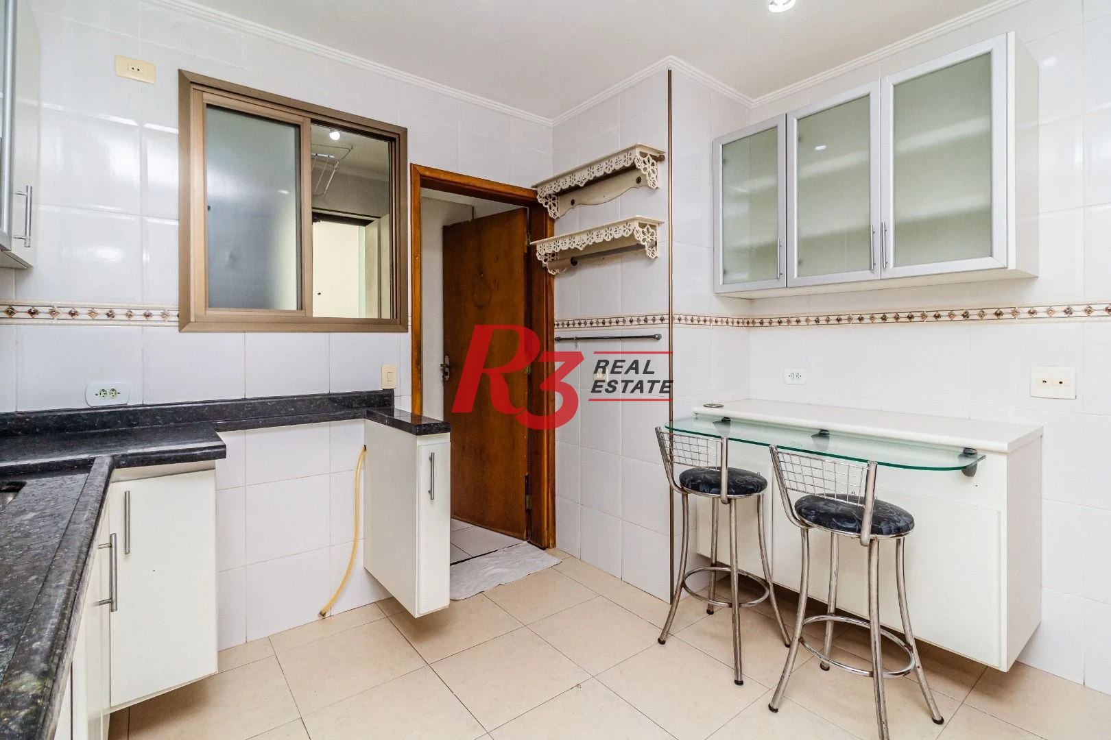 Casa com 3 dormitórios à venda, 150 m² por R$ 1.100.000,00 - Embaré - Santos/SP