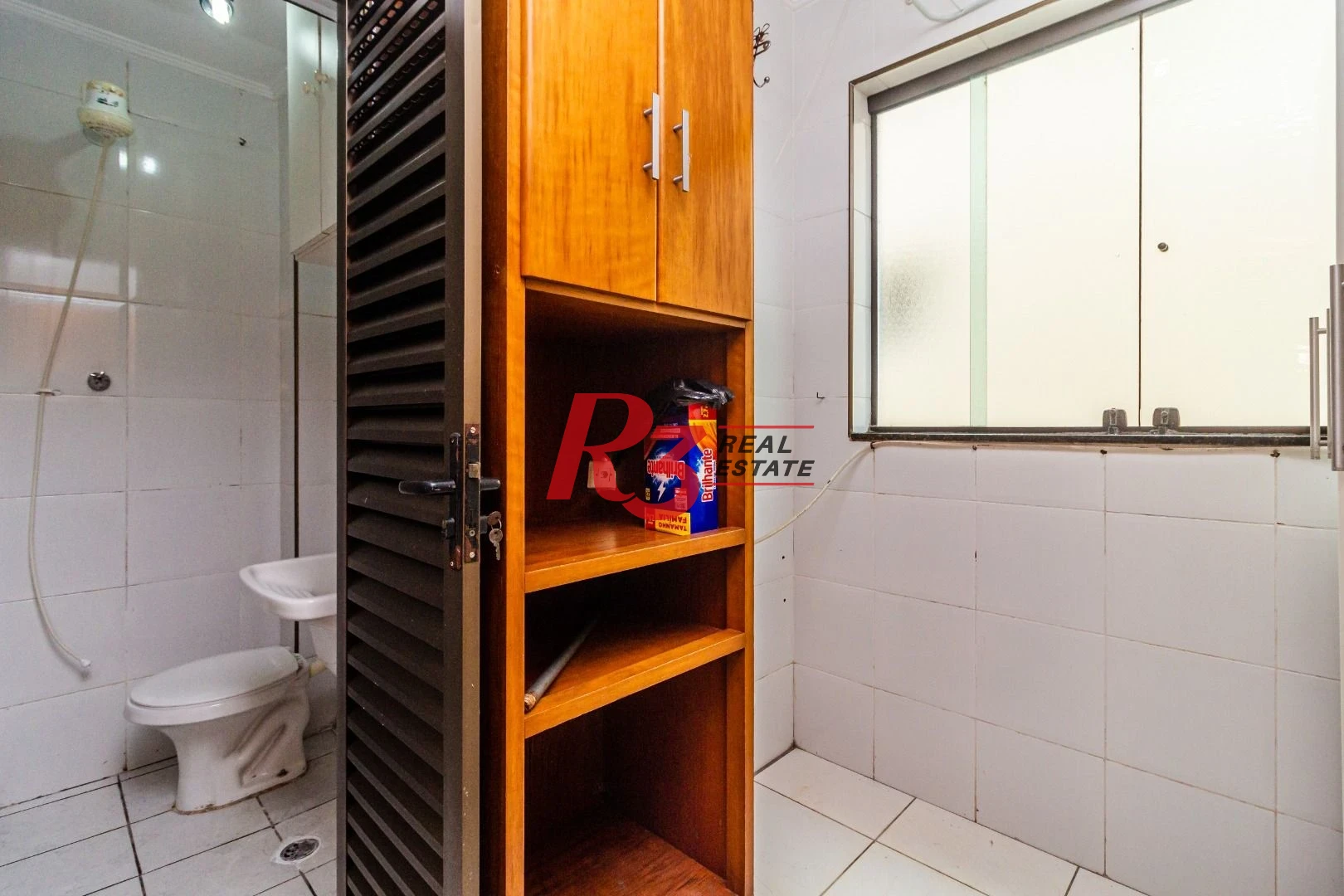 Casa com 3 dormitórios à venda, 150 m² por R$ 1.100.000,00 - Embaré - Santos/SP