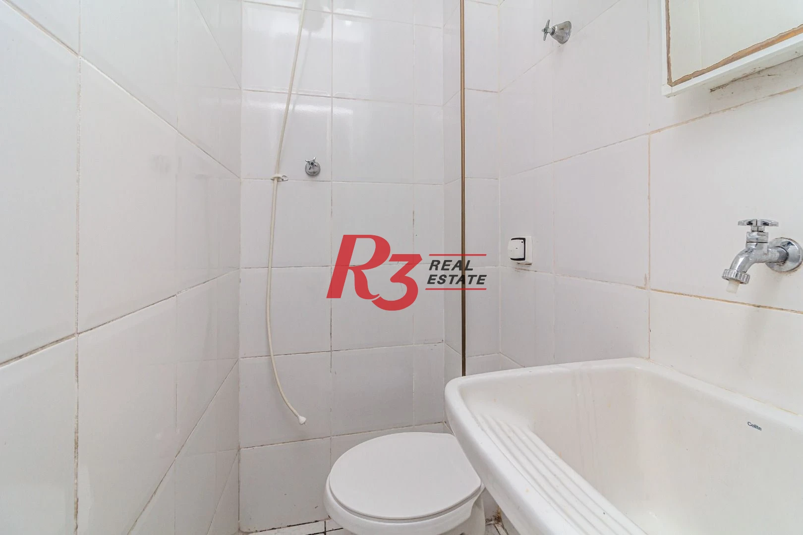 Casa com 3 dormitórios à venda, 150 m² por R$ 1.100.000,00 - Embaré - Santos/SP