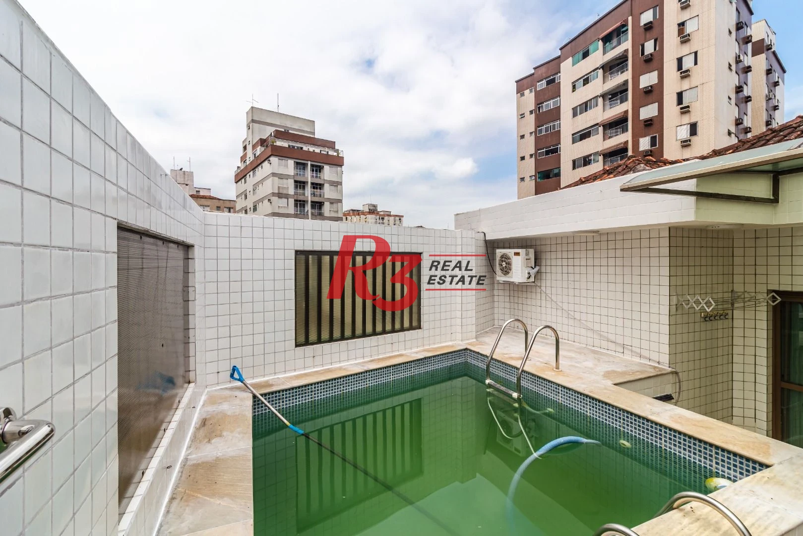 Casa com 3 dormitórios à venda, 150 m² por R$ 1.100.000,00 - Embaré - Santos/SP