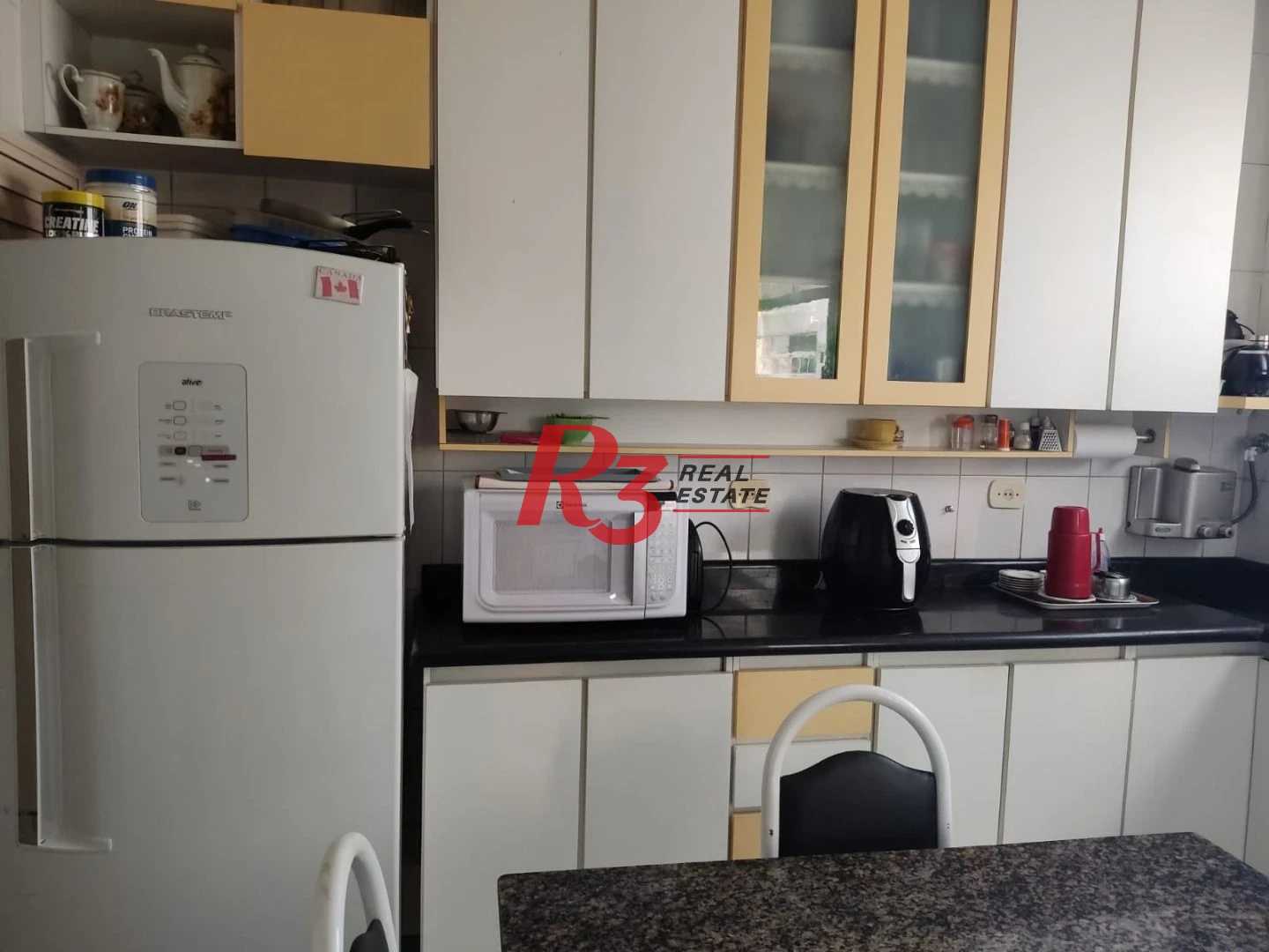 Apartamento com 3 dormitórios à venda, 102 m² por R$ 700.000,00 - Gonzaga - Santos/SP