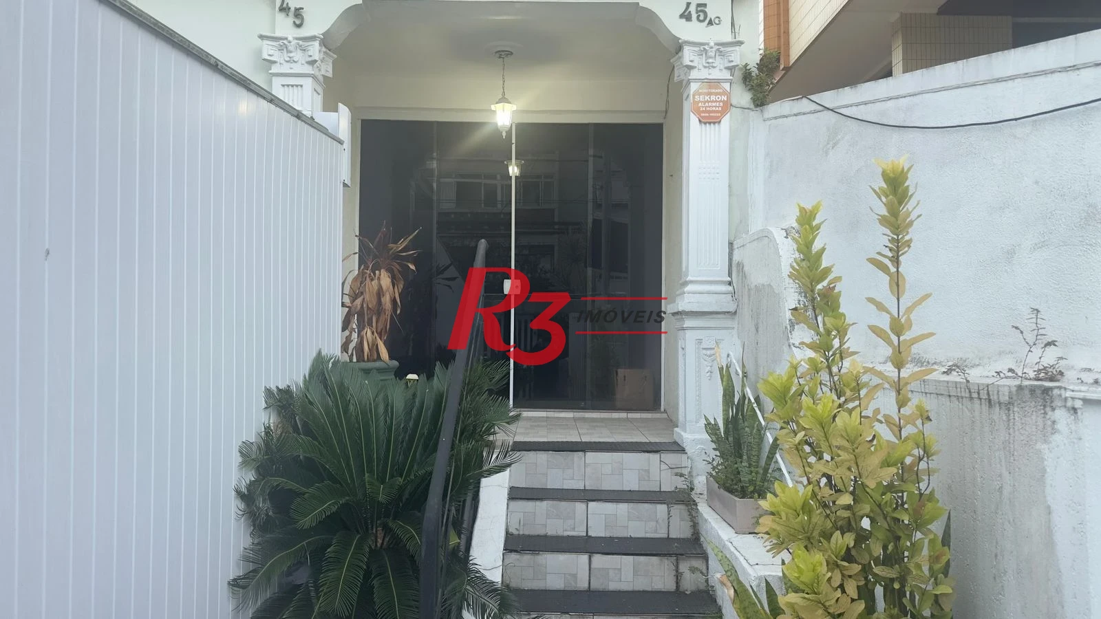 Sobrado com 5 dormitórios para alugar, 200 m² por R$ 5.000,00/mês - Gonzaga - Santos/SP