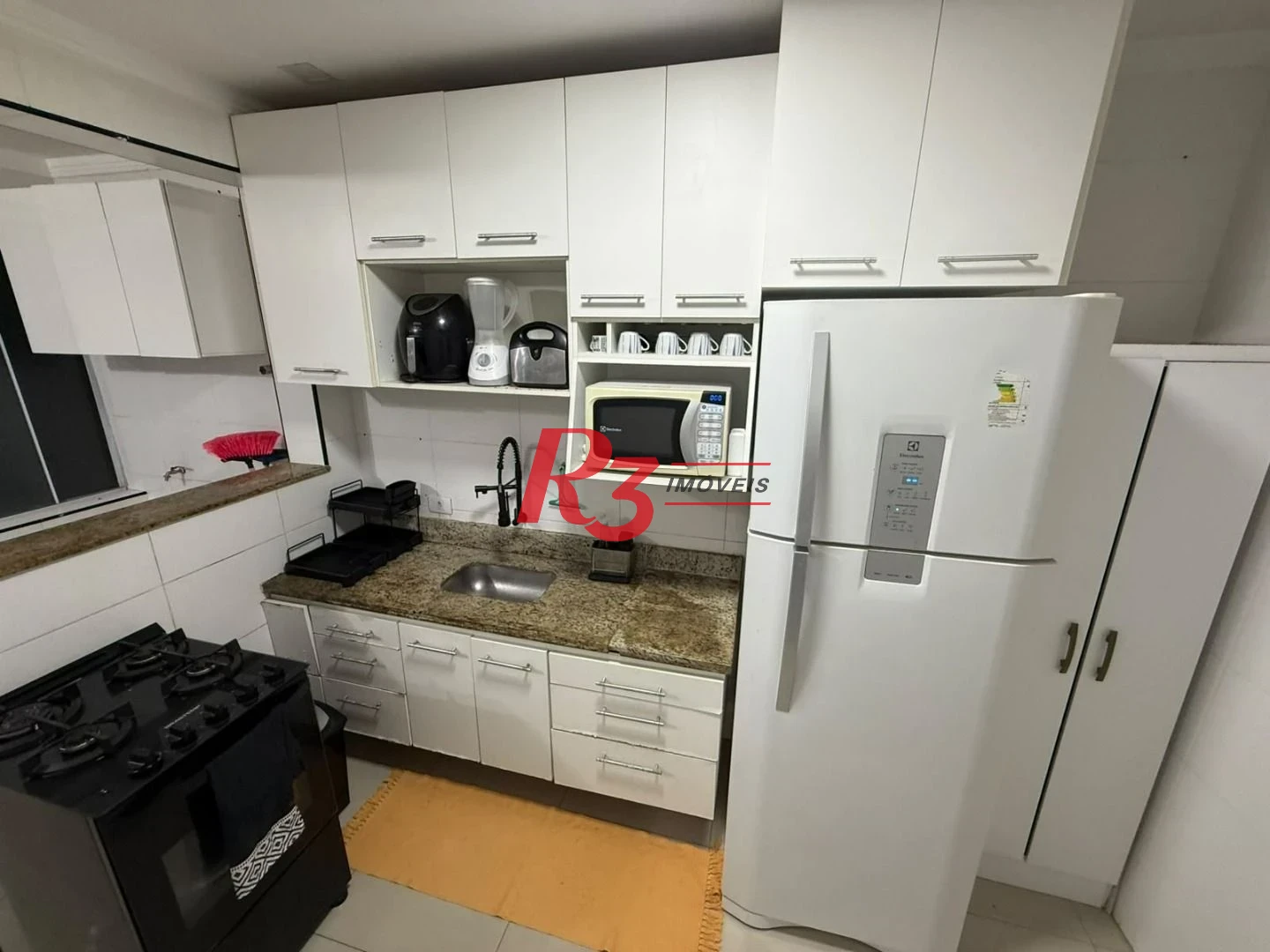 Apartamento com 2 dormitórios para alugar, 75 m² por R$ 3.500,00/mês - Gonzaga - Santos/SP