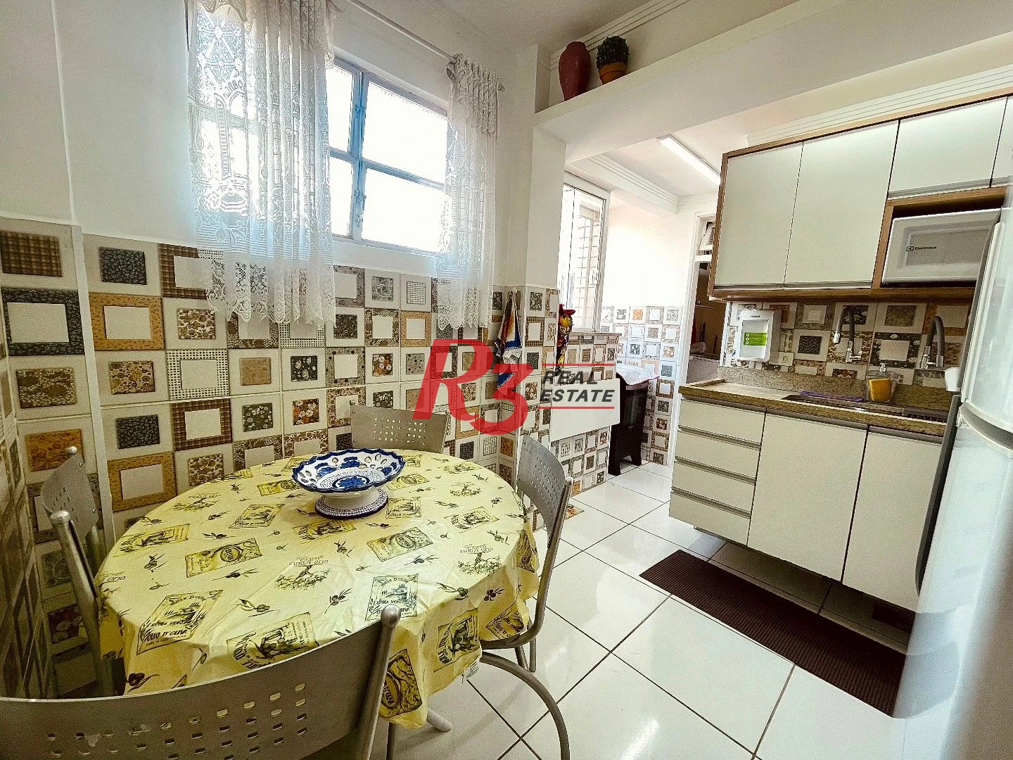 Apartamento com 2 dormitórios à venda, 65 m² por R$ 580.000,00 - Gonzaga - Santos/SP