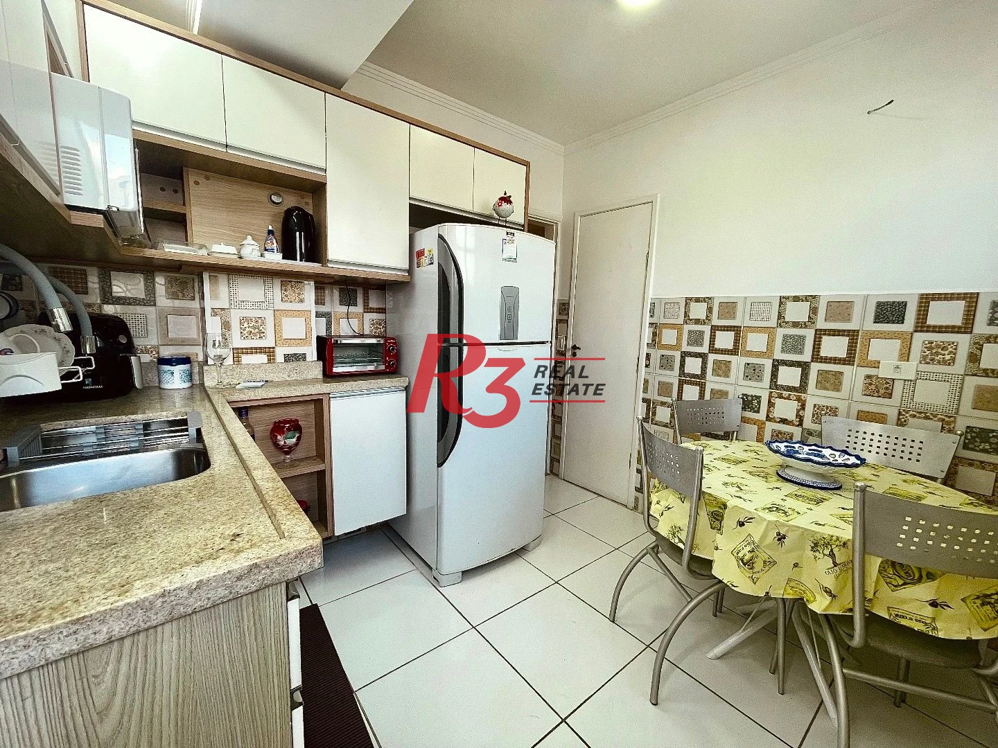 Apartamento com 2 dormitórios à venda, 65 m² por R$ 580.000,00 - Gonzaga - Santos/SP