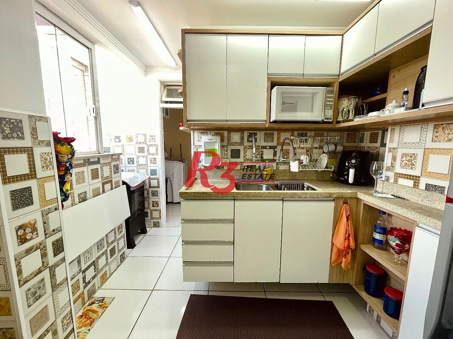 Apartamento com 2 dormitórios à venda, 65 m² por R$ 580.000,00 - Gonzaga - Santos/SP