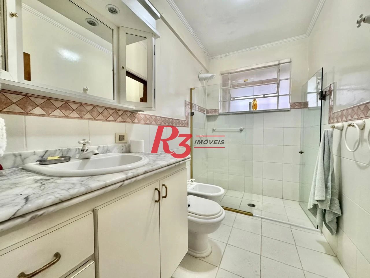Apartamento com 3 dormitórios à venda, 137 m² por R$ 950.000,00 - Gonzaga - Santos/SP