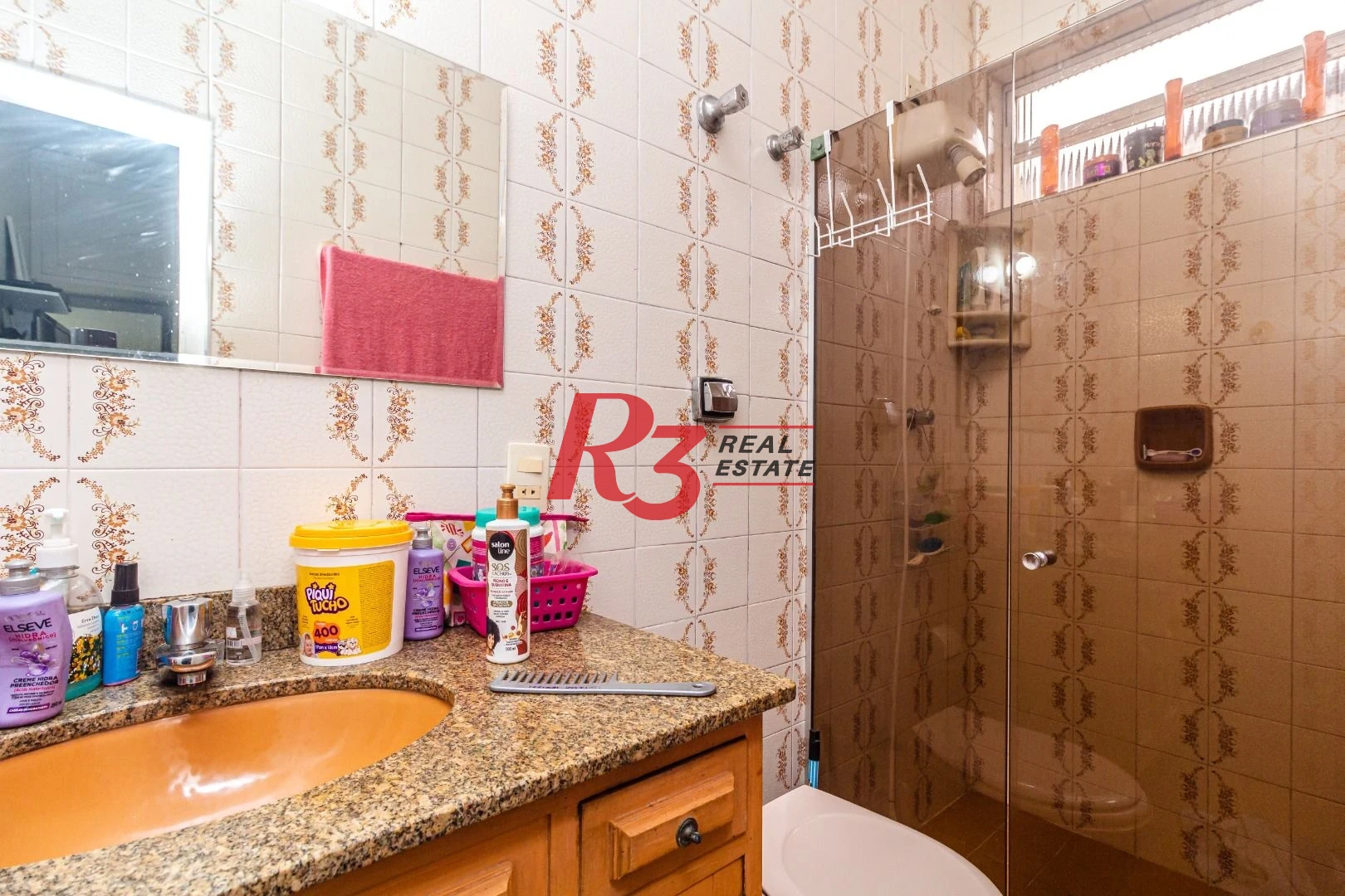 Sobrado com 3 dormitórios à venda, 138 m² por R$ 1.200.000,00 - Boqueirão - Santos/SP