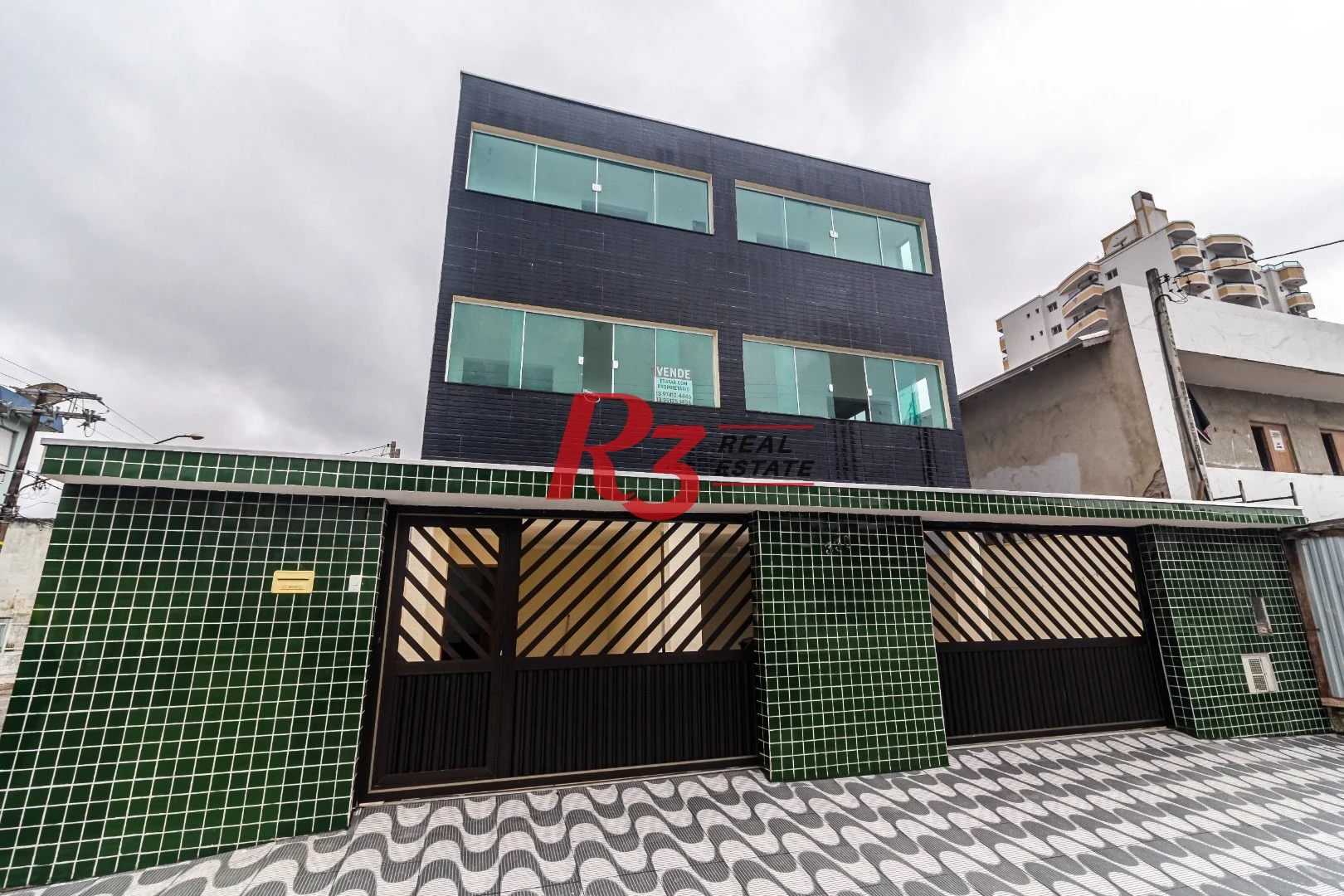 Casa com 3 dormitórios à venda, 140 m² por R$ 540.000,00 - Ocian - Praia Grande/SP