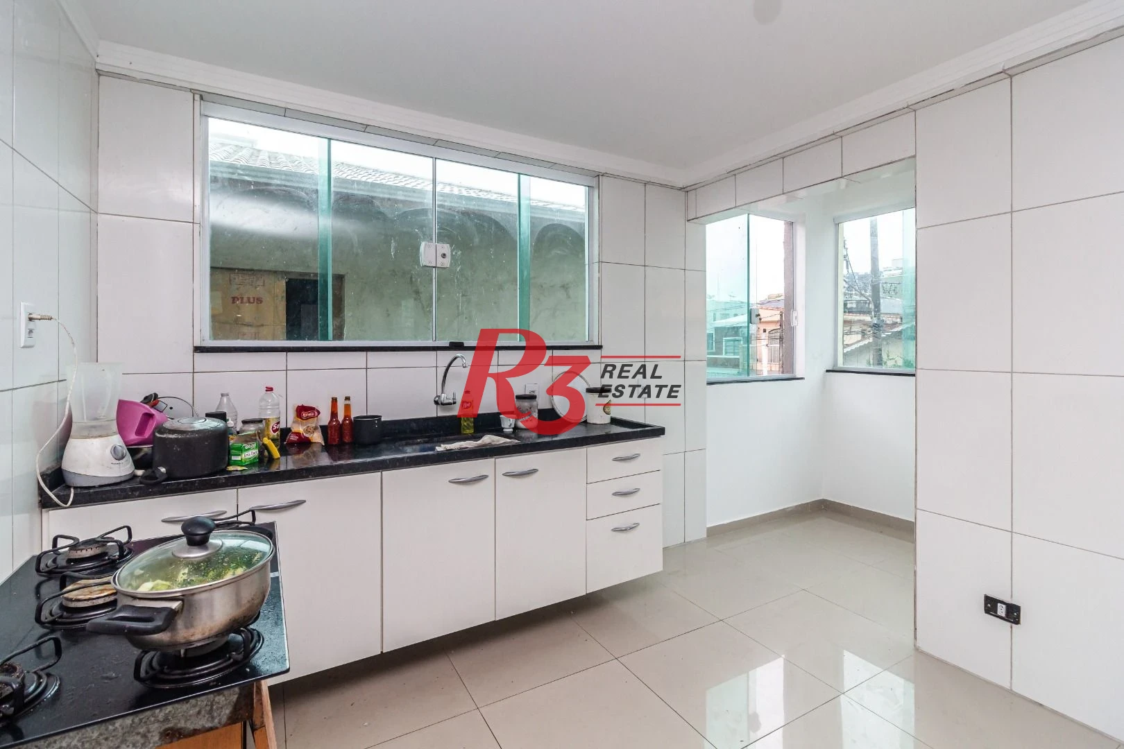 Casa com 3 dormitórios à venda, 140 m² por R$ 540.000,00 - Ocian - Praia Grande/SP