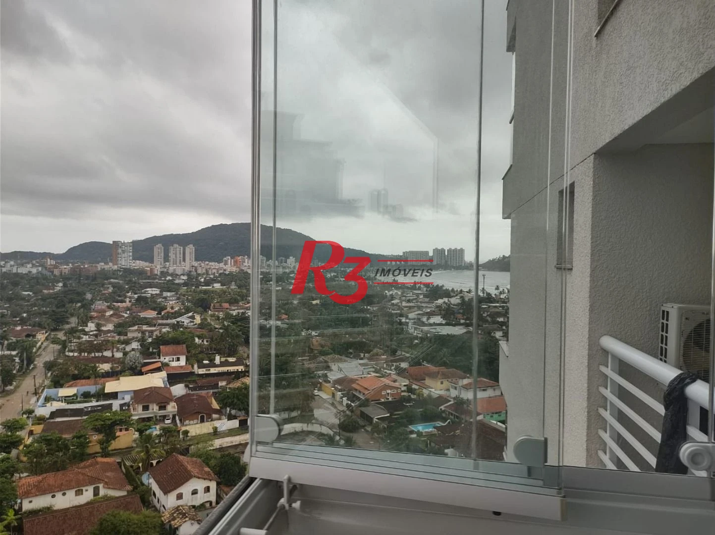 Apartamento à venda, 69 m² por R$ 750.000,00 - Praia da Enseada - Guarujá/SP